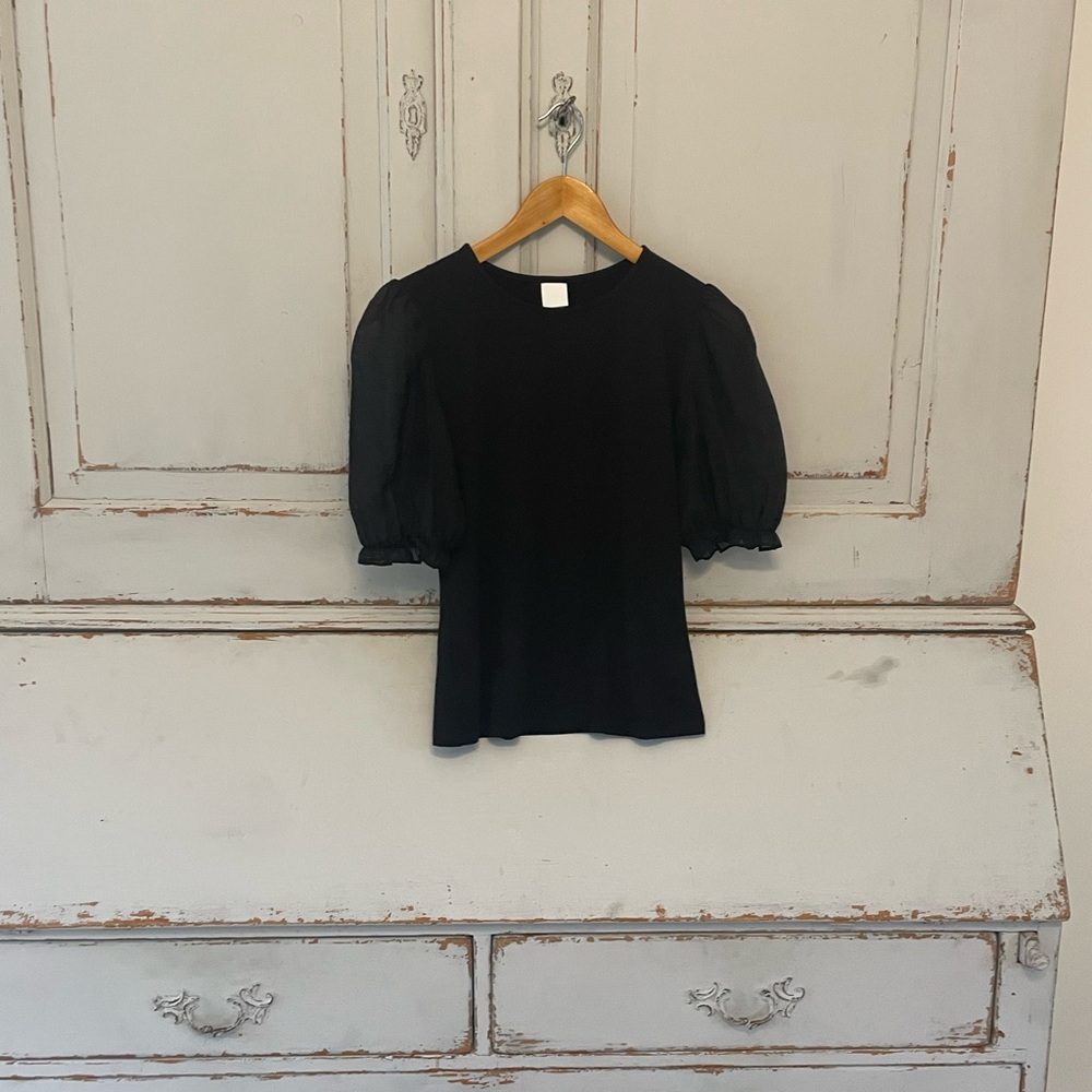 Black short sleeve top with sheer ruffled sleeve